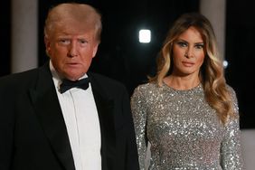 Former U.S. President Donald Trump and former first lady Melania Trump arrive for a New Years event at his Mar-a-Lago home