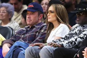 Actors Ben Affleck and Jennifer Lopez look on from the front row during the first half of a game between the Golden State Warriors and the Los Angeles Lakers at Crypto.com Arena on March 16, 2024 in Los Angeles, California. 