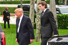 Donald Trump and his son Barron Trump attend the funeral of former first lady Melania Trump's mother Amalija Knavs