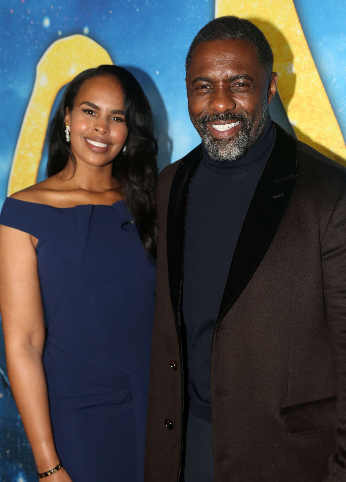 Sabrina Dhowre and Idris Elba pose at the world premiere of the new film "Cats" based on the Andrew Lloyd Webber musical at Alice Tully Hall, Lincoln Center on December 16, 2019 in New York City