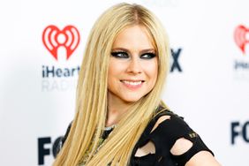 Avril Lavigne poses in the press room during the 2024 iHeartRadio Music Awards at Dolby Theatre on April 01, 2024 in Hollywood, California.