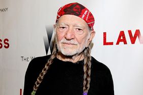 Willie Nelson walks the red carpet for the new film Lawless at the Alamo Drafthouse on August 25, 2012 in Austin, Texas.