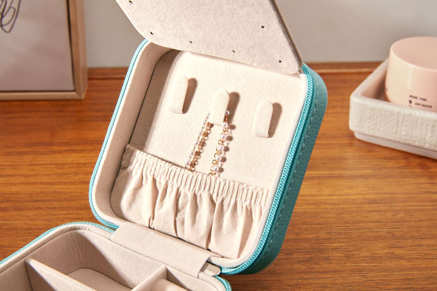 Close-up of the Vee & Co. Small Travel Jewelry Case's necklace storage compartment. 