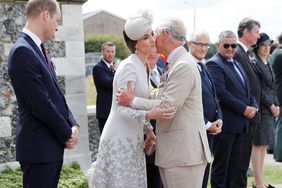 YPRES, BELGIUM - JULY 31: Prince Charles, Prince of Wales greets Catherine, Duchess of Cambridge and Prince William, Duke of Cambridge during a ceremony at the Commonwealth War Graves Commisions's Tyne Cot Cemetery on July 31, 2017 in Ypres, Belgium. The commemorations mark the centenary of Passchendaele - The Third Battle of Ypres. 