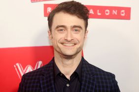 Daniel Radcliffe poses at the opening night of Stephen Sondheim's Merrily We Roll Along on Broadway at The Hudson Theater on October 8, 2023 in New York City.
