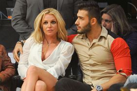 Britney Spears and Sam Asghari attend a basketball game between the Los Angeles Lakers and the Golden State Warriors