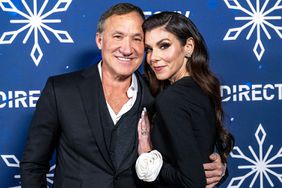 Dr. Terry Dubrow (L) and Heather Dubrow attend the DIRECTV Celebrates Christmas At Kathy's event at a private residence on November 28, 2023 in Los Angeles, California.