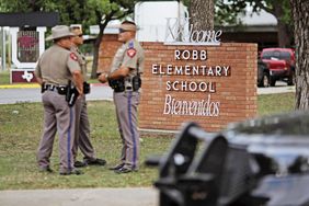 Texas state troopers outside Robb Elementary School in Uvalde, Texas, US, on Tuesday, May 24, 2022. Fourteen students and one teacher were killed during a massacre in a Texas elementary school, the deadliest US school shooting in more than four years. Photographer: Eric Thayer/Bloomberg via Getty Images