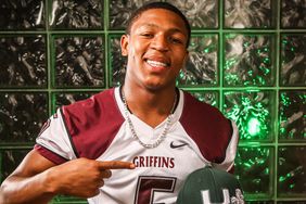 Ray Lewis III, after committing to the University of Miami, poses for a photo during a pre-national signing day event on Jan. 30, 2013, in Orlando, Florida