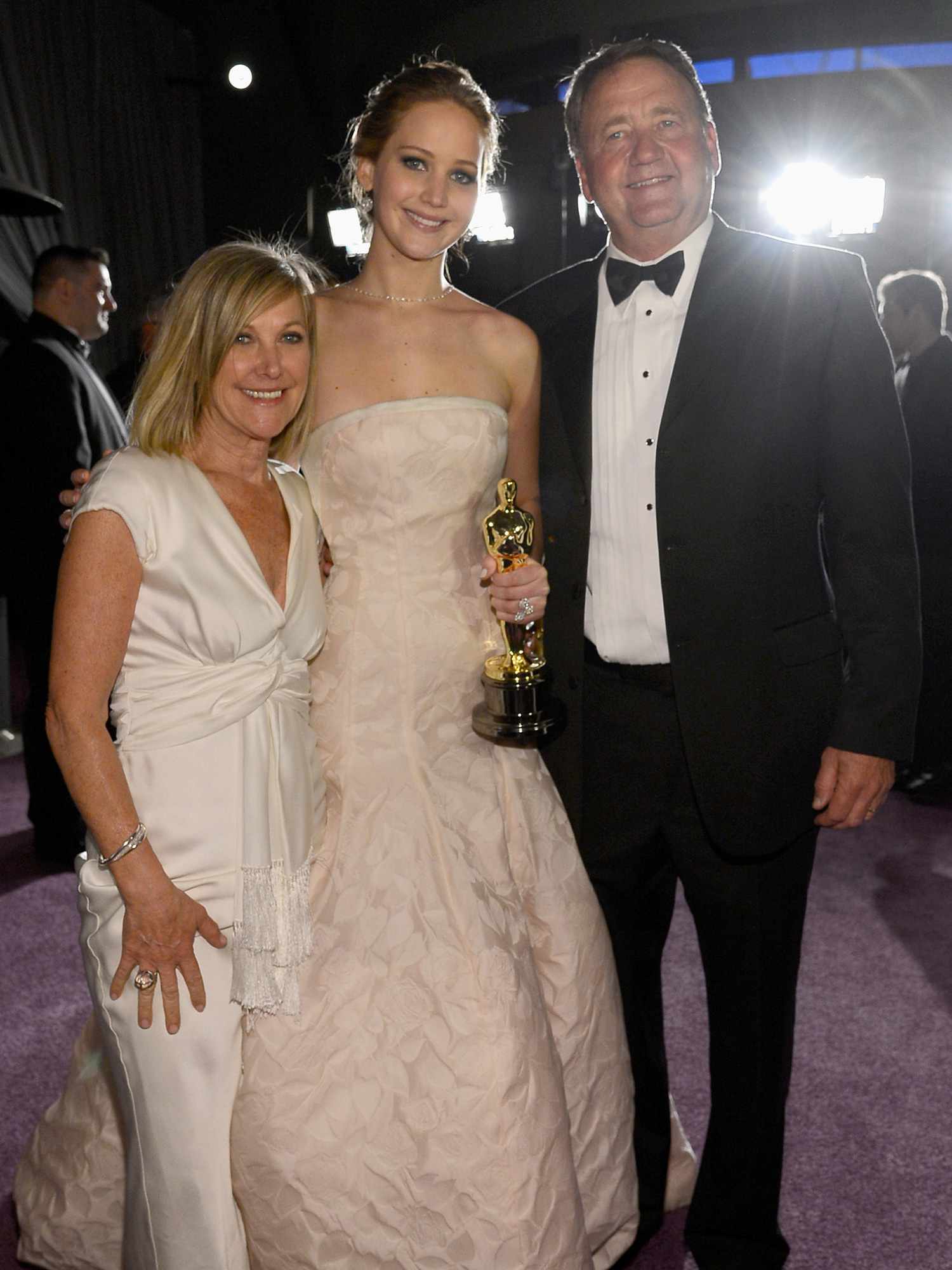 Jennifer Lawrence, Karen Lawrence, and Gary Lawrence attend the 2013 Oscars Governors Ball