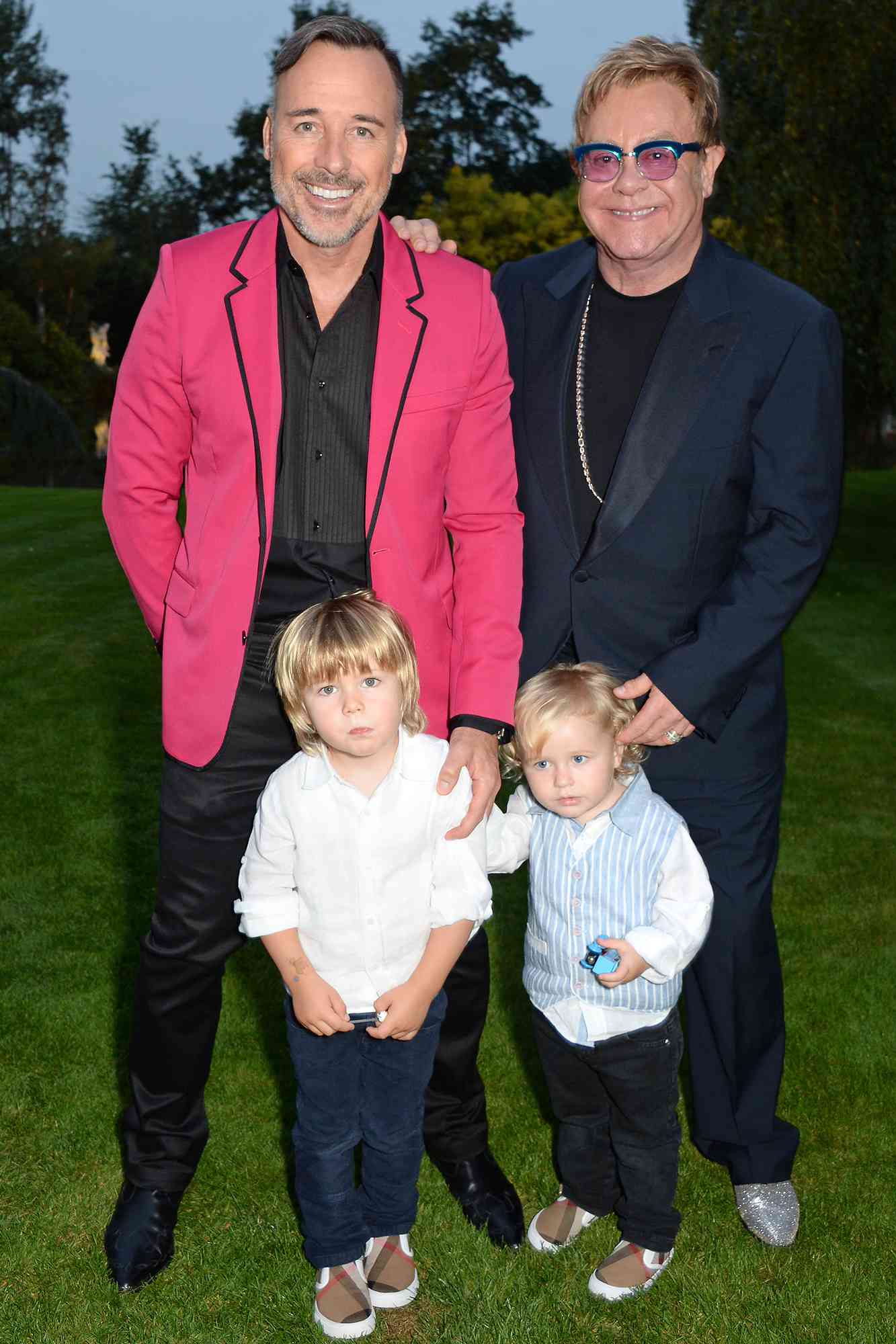David Furnish, Zachary Furnish-John, Elijah Furish-John and Sir Elton John attend the Woodside End of Summer party