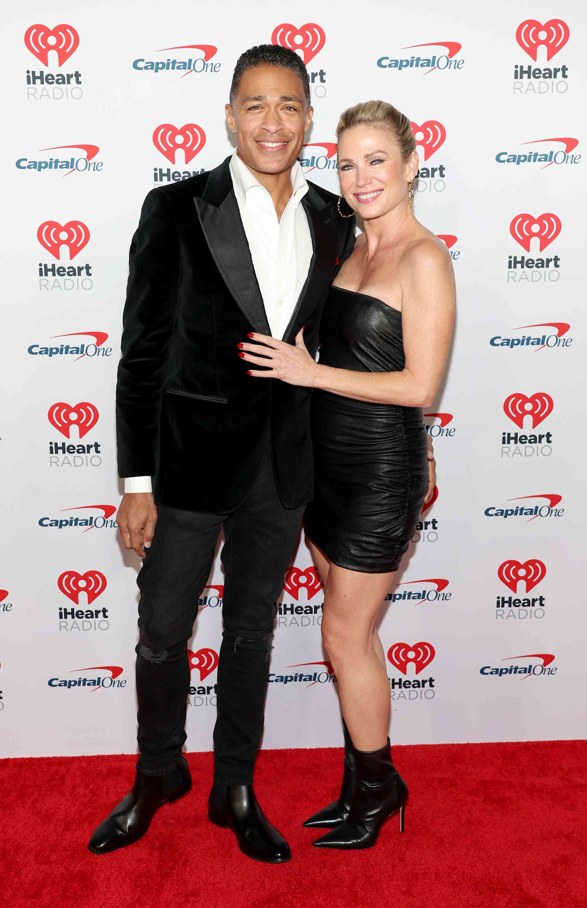 T.J. Holmes and Amy Robach attend iHeartRadio 102.7 KIIS FM's Jingle Ball 2023 Presented by Capital One at The Kia Forum on December 01, 2023 in Los Angeles, California.
