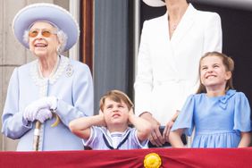 Queen Elizabeth II, Prince Louis of Cambridge, Princess Charlotte of Cambridge and Prince George of Cambridge during Trooping the Colour on June 02, 2022