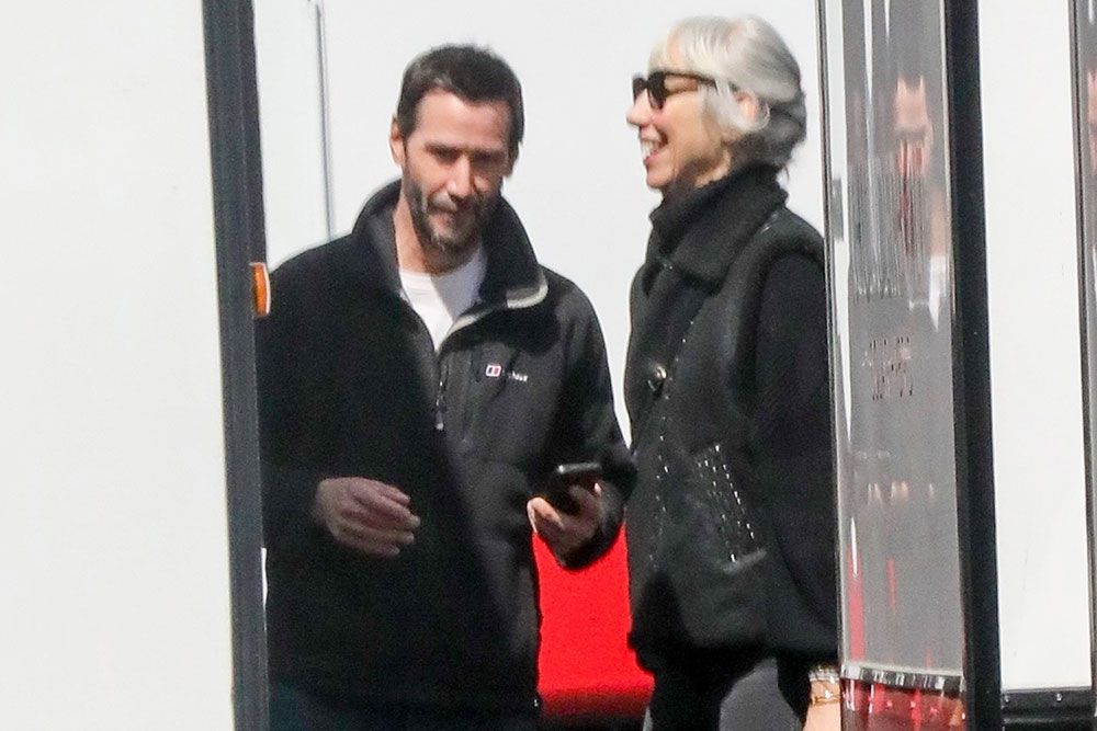 *PREMIUM-EXCLUSIVE* - Keanu Reeves and his girlfriend Alexandra Grant were spotted during very rare sighting together, sharing a kiss on the set of his upcoming movie