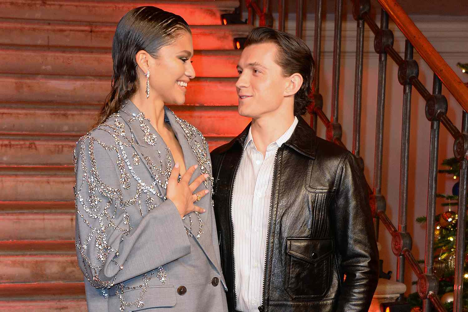 Zendaya and Tom Holland pose at a photocall for "Spider-Man: No Way Home" at The Old Sessions House on December 5, 2021 in London, England. 