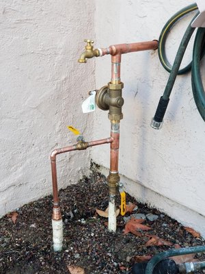 Photo of Repipe Home Hero - Plumbing & Pipe Specialist - San Diego, CA, US. Main shut off valve connected with sprinkler lines