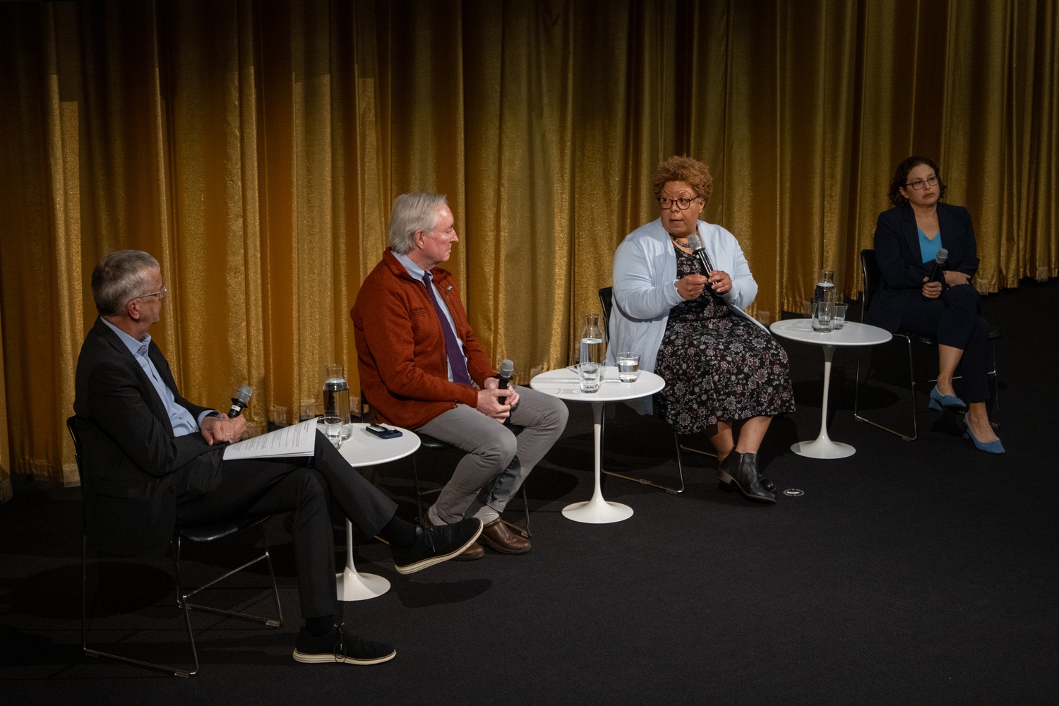 From left to right: Chris Herbert moderates a panel on homelessness and housing with Dr. Jim O'Connell, Peggy Bailey, and Dr. Margot Kushel. Kushel gave the Harvard Joint Center for Housing Studies' 23rd John T. Dunlop Lecture on Thursday.