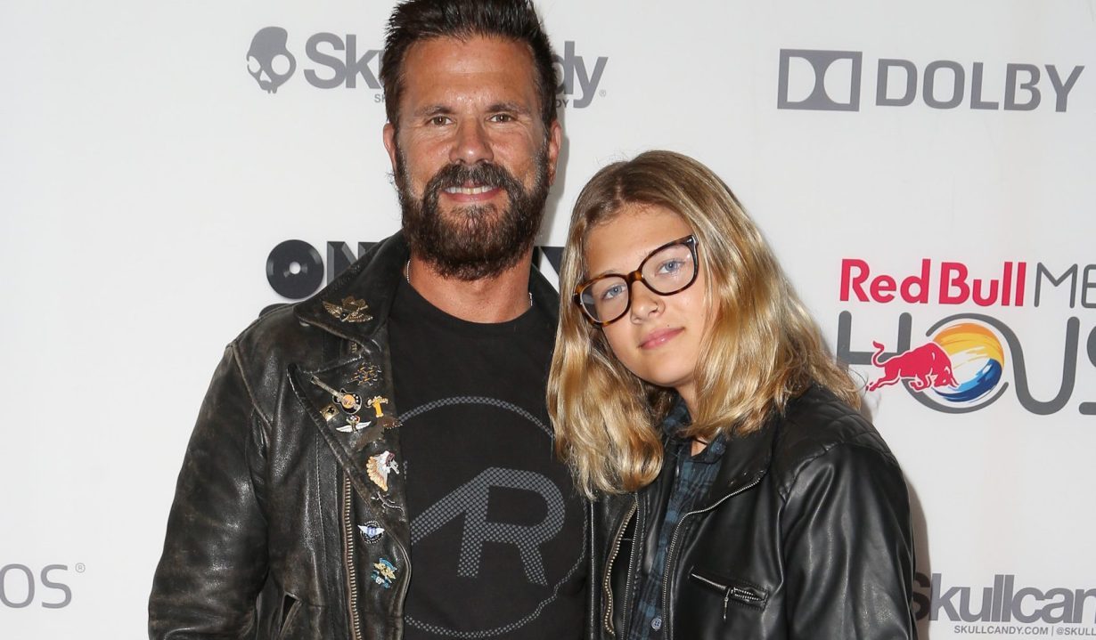 HOLLYWOOD, CA - OCTOBER 22: Actor Lorenzo Lamas (L) and daughter Victoria Lamas arrive at the "On Any Sunday, The Next Chapter," a film from Red Bull Media House, premiere at Dolby Theatre on October 22, 2014 in Hollywood, California. The film releases nationwide on November 7. (Photo by Chelsea Lauren/Getty Images for Red Bull Media House)