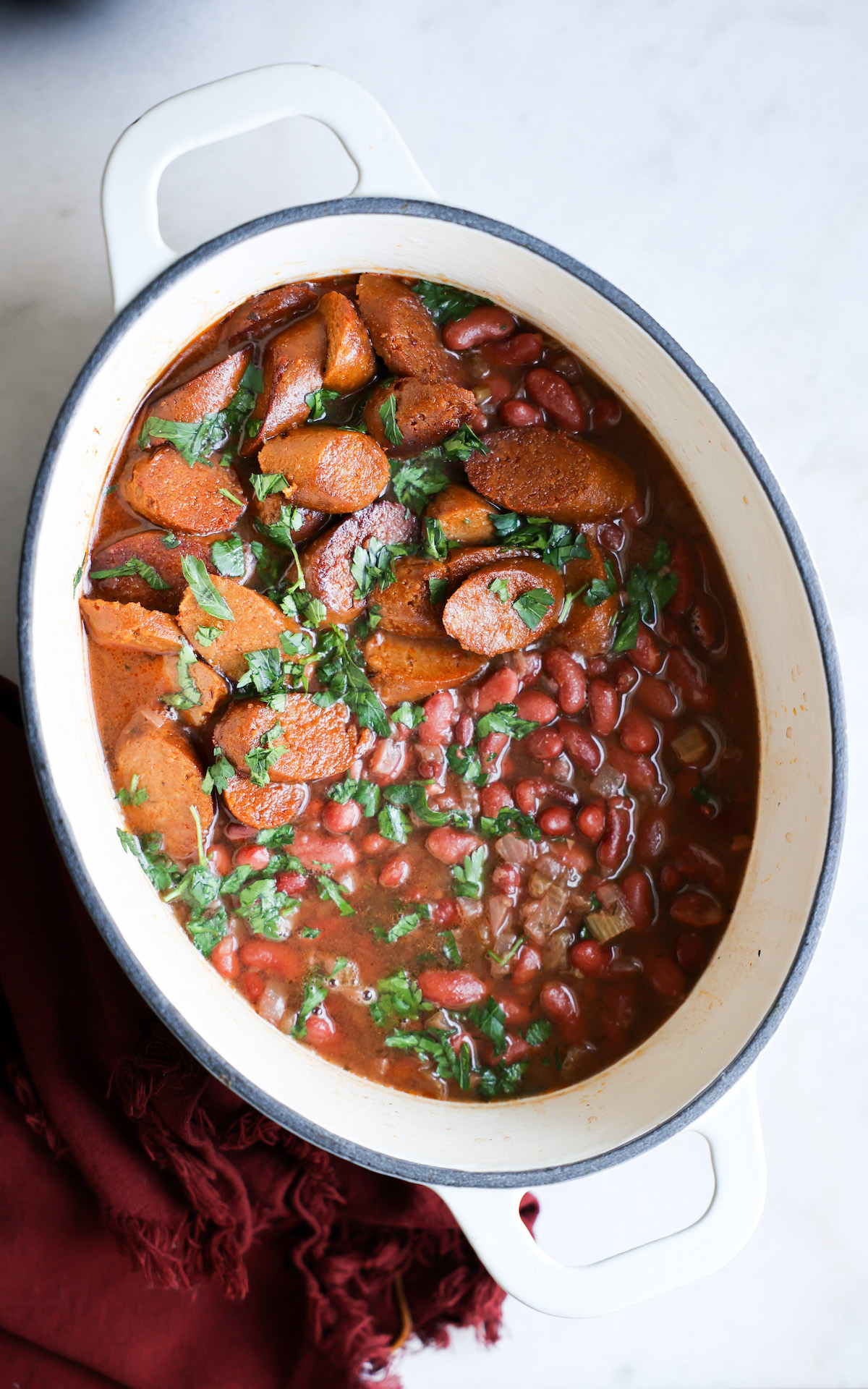cooked red beans in a white dutch oven pot