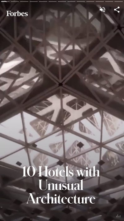 Ceiling of a hotel with text "10 hotels with unusual architecture"
