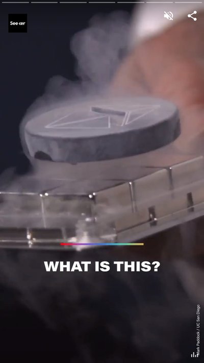 A supercondocutor puck pulled from liquid nitrogen