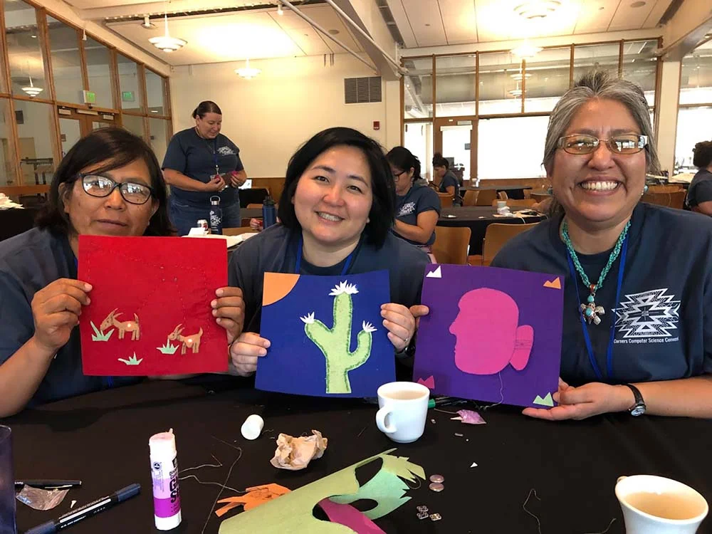 Three educators share their Indigenous inspired art as part of a professional development activity at the Four Corners Conference in 2023.