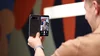 Man holding Pixel Fold as he takes a selfie.