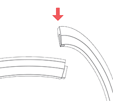 Detached band with an arrow showing how to slide the band down into the slot on the pebble