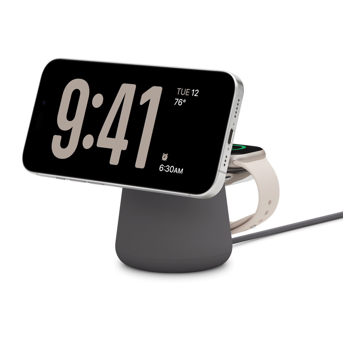 Belkin Boost Charge Pro 2-in-1 Wireless Charging Dock with MagSafe in Charcoal colour simultaneously charging iPhone 15 Pro White Titanium finish and Apple Watch Series 9, 41mm case, Starlight finish.
