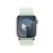 Sport Loop-rem i lys mynte vist forfra med Apple Watch-urskive og Digital Crown