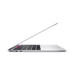 Deels opengeklapte MacBook Pro, toetsenbord, twee USB-C-poorten aan de zijkant.