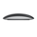 Side of Magic Mouse showing black surface and aluminum base.