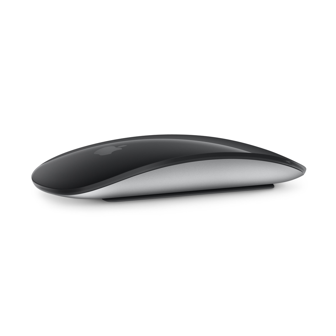 Magic Mouse negro, se muestra su diseño curvo y la superficie Multi-Touch.
