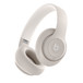 Beats Studio Pro Wireless Headphones in Sandstone, with multi-function on-ear controls.