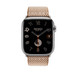 Image montrant le bracelet Toile H simple tour gold (or) et écru et le cadran d’une Apple Watch. 