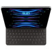 Imagem de cima para baixo do iPad Pro de 11 polegadas cinza-espacial com Smart Keyboard Folio preto. Tela que mostra uma imagem colorida.