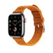 オレンジのトリコシンプルトゥールストラップ。Apple Watchの文字盤とDigital Crownが見えている。