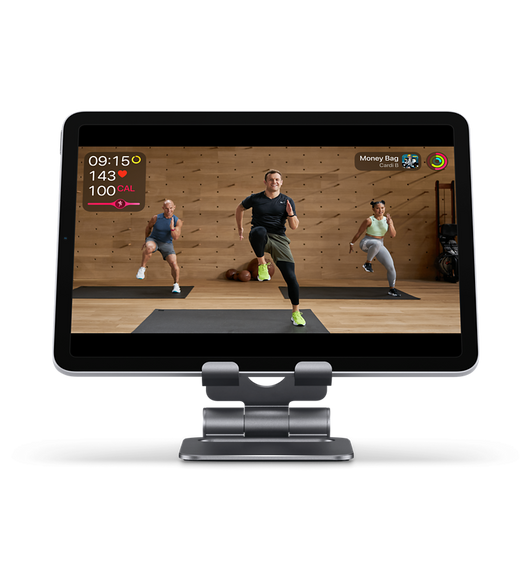 Satechi 折叠式铝金属底座可稳固放置 iPhone 或 iPad，方便你观看健身视频或进行 FaceTime 通话。