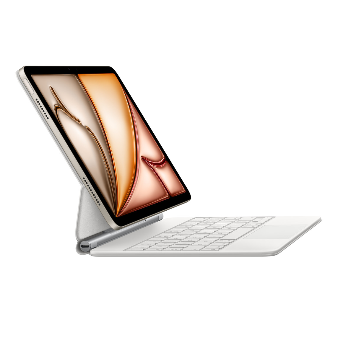 适用于 11 英寸 iPad Pro (第三代) 和 iPad Air (第五代) 的白色妙控键盘安装在 iPad 上。