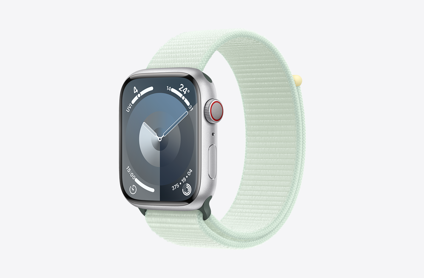 Apple Watch with Silver Aluminium case with matt finish and angled view of Soft Mint (green) Sport Loop, featuring a hook-and-loop fastener and double-layer nylon weave