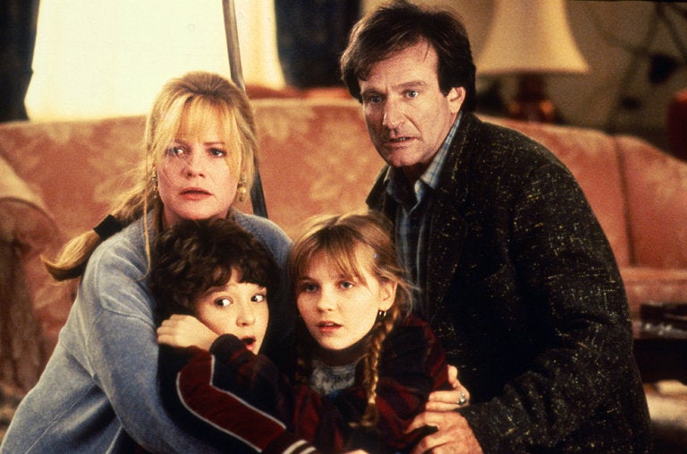 From left, Bonnie Hunt, Bradley Pierce, Kirsten Dunst and Robin Williams in “Jumanji” (1995).