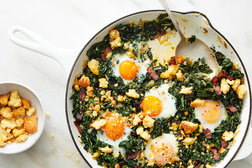 Image for Baked Eggs With Kale, Bacon and Cornbread Crumbs