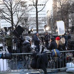 Members of the news media waited for former President Donald J. Trump to arrive at State Supreme Court in Manhattan on March 25 for a hearing on his criminal case.