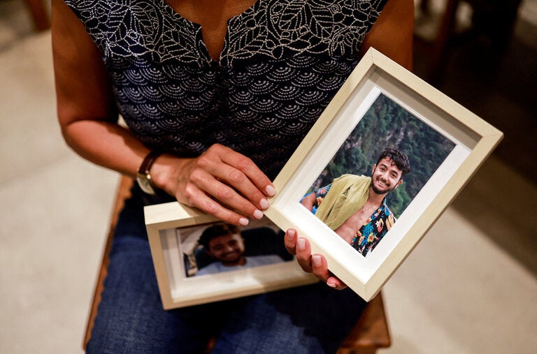 A photo of Hersh Goldberg-Polin held by his mother, Rachel Goldberg-Polin, in their home in Jerusalem.
