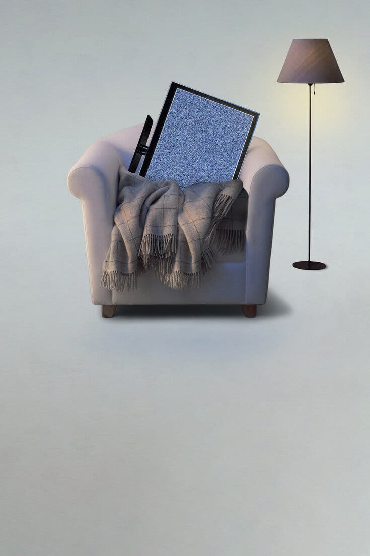 A photo-illustration shows a television monitor tucked into a blanket placed on an armchair, with a lamp in the background.