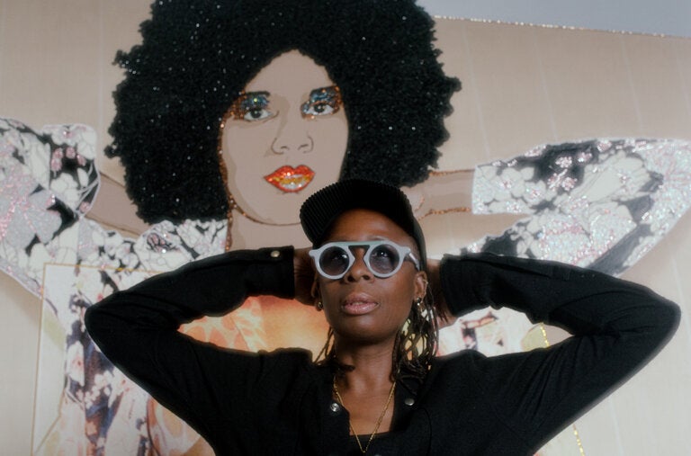 The artist Mickalene Thomas in front of her work “Portrait of Maya No. 10” (2017). The scope of her career so far will be captured in an exhibition at the Broad Museum opening on May 25.