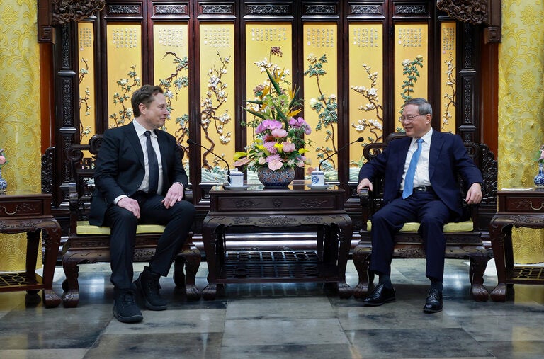 Elon Musk, the Tesla chief executive, met with China’s premier, Li Qiang, in Beijing on Sunday.
