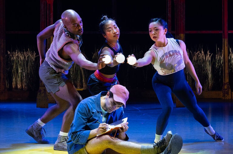 Ricky Ubeda, seated, with, from left: Byron Tittle, Christine Flores and Kara Chan in “Illinoise” at the Park Avenue Armory in Manhattan.