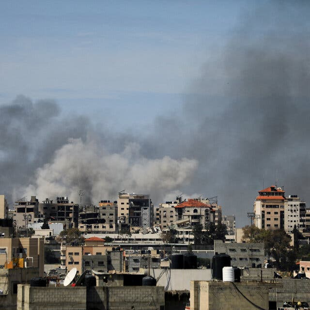 Smoke rises from a cityscape in Gaza.